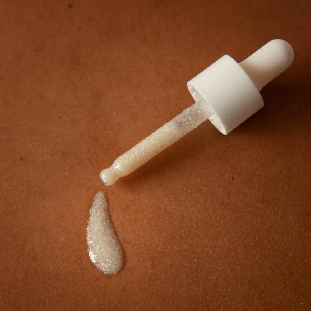 Olio secco illuminante per capelli e pelle